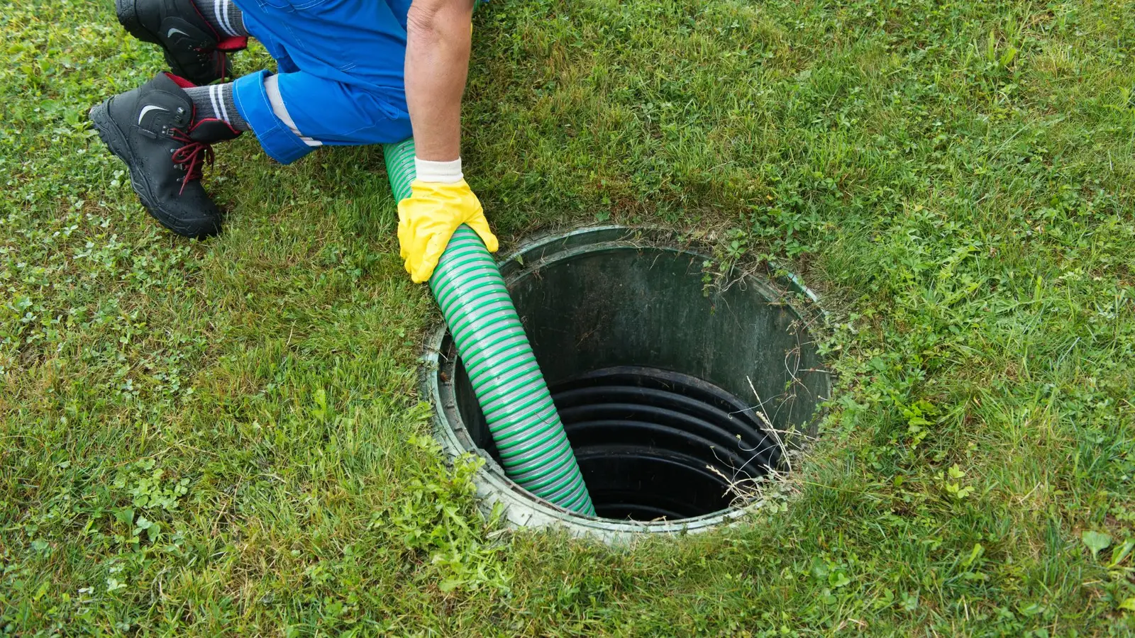Professional septic system cleaning in progress